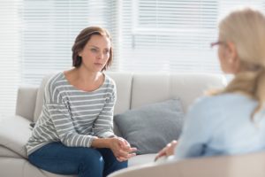 woman-psychologist-talking-medical-assessment